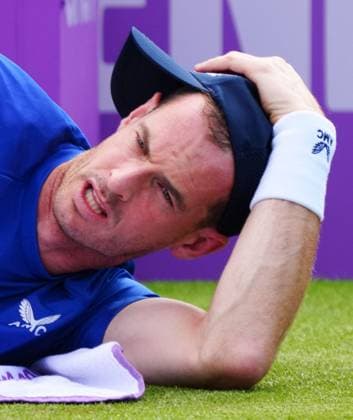 Andy Murray is forced to retire with an injury in the first set Cinch Championships, Day 3, Tennis, Queen s Club, London, UK - 19 June 2024  Copyright: xJavierxGarcia Shutterstockx 14543332at