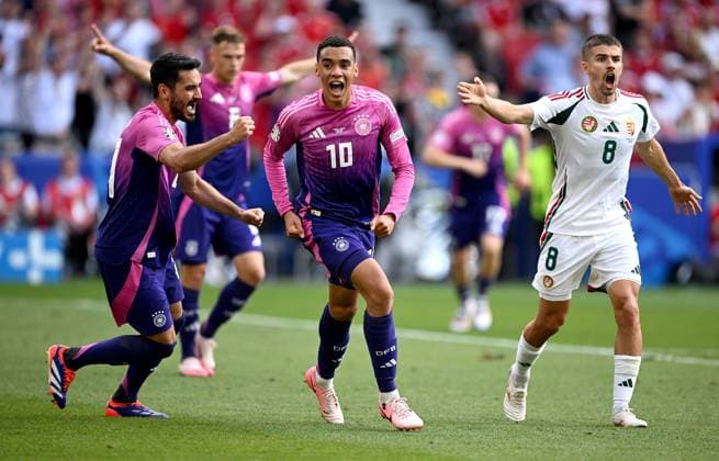 Soccer Euro 2024 Group A 19 06 2024 Germany Hungary Cheering Germany after the goal for 1 0 by goal scorer Jamal Musiala center and Ilkay Guendogan left Disappointment at Adam Nagy right, Hungary