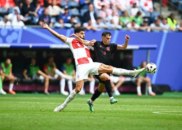 Hamburg, Germany: Josko Gvardiol of Croatia and Jasir Asani of Albania during the EURO 2024, Group B football match between Albania and Croatia on 19 June 2024 at Volksparkstadion Hamburg, Germany. Photo Nderim Kaceli UEFA European Football Championship - UEFA EURO, EM, Europameisterschaft,Fussball 2024 - Croatia vs Albania  - ZUMAp169 20240619_zsa_p169_068 Copyright: xNderimxKaceli IPAxSportx