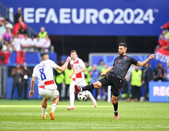 Hamburg, Germany: Klaus Gjasula of Albania and Andrej Kramaric of Croatia during the EURO 2024, Group B football match between Albania and Croatia on 19 June 2024 at Volksparkstadion Hamburg, Germany. Photo Nderim Kaceli UEFA European Football Championship - UEFA EURO, EM, Europameisterschaft,Fussball 2024 - Croatia vs Albania  - ZUMAp169 20240619_zsa_p169_094 Copyright: xNderimxKaceli IPAxSportx