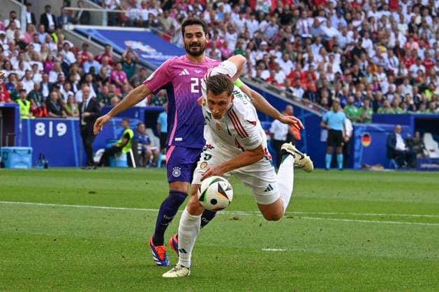19 06 2024, xsltx, Football EM 2024, Germany Hungary emspor, v l Ilkay Guendogan Gündogan, Germany, 21 , Willi Orban Hungary, 6 duel, duel, fight, tackle DFL DFB REGULATIONS PROHIBIT ANY USE OF PHOTOGRAPHS as IMAGE SEQUENCES and or QUASI VIDEO Stuttgart