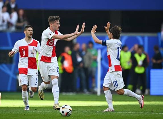 UEFA European Football Championship - UEFA EURO, EM, Europameisterschaft,Fussball 2024 - Croatia vs Albania Marko Pjaca of Croatia and Luka Sucic of Croatia during the EURO 2024, Group B football match between Albania and Croatia on 19 June 2024 at Volksparkstadion Hamburg, Germany. Photo Nderim Kaceli Hamburg Germany  Copyright: xIPAxSport ABACAx