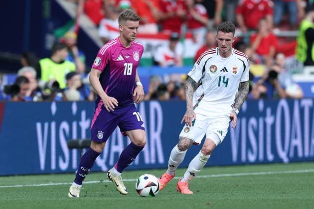 Soccer UEFA EURO 2024 group stage 2 matchday Germany Hungary on 19 06 2024 at Stuttgart Arena in Stuttgart Maximilian Mittelstädt Germany , left Bendeguz Bolla Hungary , right xMSx