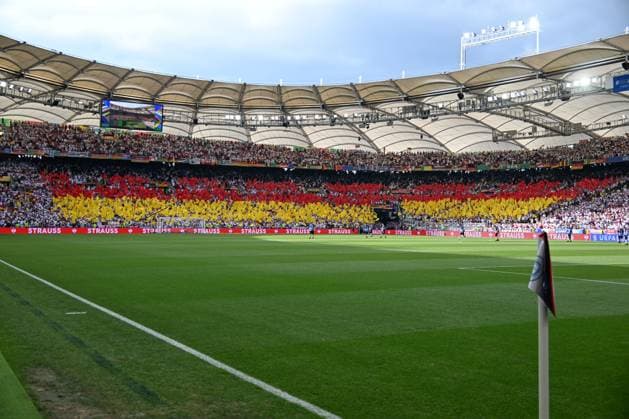 19 06 2024, xsltx, European Football Championship 2024, Germany Hungary emspor, v l symbol photo, symbol image, symbol fans, spectators, audience, tribute German fans choreo, choreography, choreography DFL DFB REGULATIONS PROHIBIT ANY USE OF PHOTOGRAPHS as IMAGE SEQUENCES and or QUASI VIDEO Stuttgart