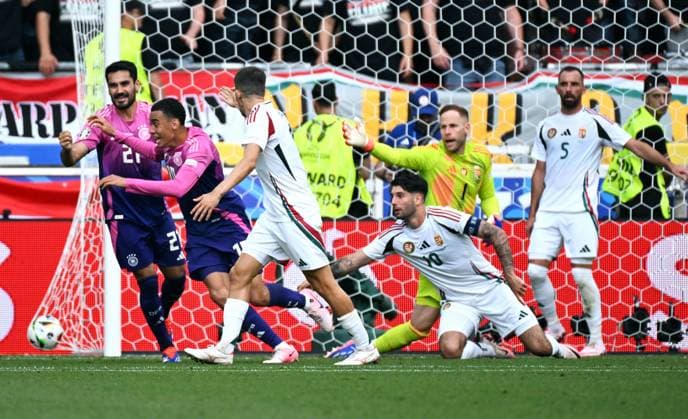 Football, European Championship, EURO 2024, Group A, MHP Arena Stuttgart Germany Hungary Cheers Jamal Musiala GER after his goal to make it 1-0, together with Ilkay Gündogan GER Cheers, joy, action