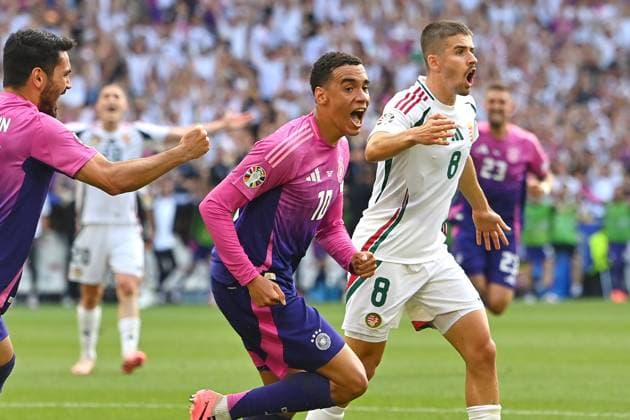 Goal celebration Jamal MUSIALA GER after scoring 1 0,cheering,joy,enthusiasm,action,left Ilkay Guendogan GER , right Adam NAGY HUN Group stage Group A Germany GER Hungary HUN on 19 06 2024, Stuttgart Arena Football UEFA EURO 2024 GERMANY from 14 06 2024 14 07 2024