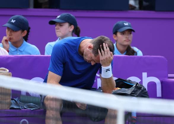 19th June 2024; Cinch Championships, Queens Club, West Kensington, London, England: Cinch Championships Queens Club, Day 3; Andy Murray (GBR) scratching his head in his chair before conceding the match against Jordan Thompson (AUS) in the first set due to injury, mens singles match  ActionPlus12656918 JohnxPatrickxFletcher
