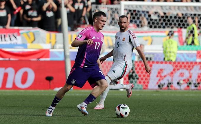 Florian Wirtz, Attila Fiola duel match scene Action Sport Football Soccer European Championship Euro 2024 European Championship Men Season 2023 2024 19 06 2024 Germany GER vs Hungary HUN in Stuttgart DFL regulations prohibit any use of photographs as image sequences and or quasi video