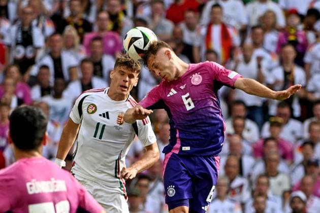 19 06 2024, xpsx, Football EM 2024, Germany Hungary emspor, v l Milos Kerkez Hungary Joshua Kimmich German Football National Team DFB Zweikampf, action, action, battle for the ball DFL DFB REGULATIONS PROHIBIT ANY USE OF PHOTOGRAPHS as IMAGE SEQUENCES and or QUASI VIDEO Stuttgart