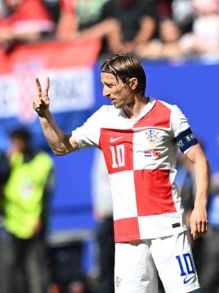(240619) -- HAMBURG, June 19, 2024 -- Luka Modric of Croatia gestures during the UEFA EURO, EM, Europameisterschaft,Fussball 2024 Group B match between Croatia and Albania in Hamburg, Germany on June 19, 2024. ) (SP)GERMANY-HAMBURG-FOOTBALL-EURO 2024-CROATIA VS ALBANIA XiaoxYijiu 