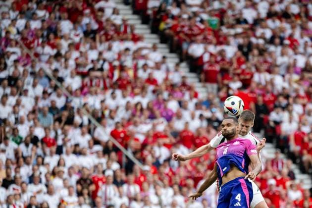 240619 Jonathan Tah of Germany and Barnabas Varga of Hungary during the UEFA Euro 2024 Football Championship match between Germany and Hungary on June 19, 2024 in Stuttgart Photo Jesper Zerman BILDBYRAN kod JZ JZ0542 fotboll football soccer fotballs em europamästerskap em uefa euro uefa european football championship euro 2024 tyskland germany hungary bbeng  Copyright: JESPERxZERMAN BB240619JZ114