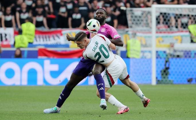 Antonio Rüdiger in a duel with Roland Sallai Sport Football Soccer European Championship Euro 2024 European Championship Men Season 2023 2024 19 06 2024 Germany GER vs Hungary HUN in Stuttgart DFL regulations prohibit any use of photographs as image sequences and or quasi video