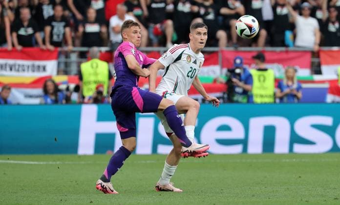 Joshua Kimmich in a duel with Roland Sallai Sport Football Soccer European Championship Euro 2024 European Championship Men Season 2023 2024 19 06 2024 Germany GER vs Hungary HUN in Stuttgart DFL regulations prohibit any use of photographs as image sequences and or quasi video
