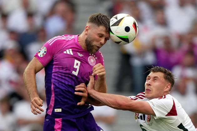 Germany s Niclas Fuellkrug fight for the ball with Hungary s Willi Orban during the Euro 2024 soccer match between Germany and Hungary at the Stuttgart Arena , Stuttgart , Germany - Wednesday 19 June 2024. - Soccer .  Copyright: xSpada LaPressex