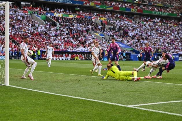 Goalscorer Jamal Musiala Germany,10 scores for 1 0 against goalkeeper Peter Gulacsi Hungary,1 Football, Men, Season 2023 24, Euro 20204 Group A 2 Matchday in Stuttgart, Germany Hungary, v l , 19 06 2024, Copyright: xMatthiasxKochx