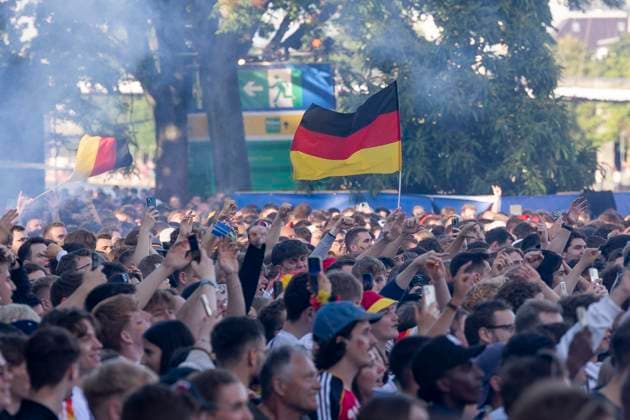 Fanzone Fan Mile Frankfurt am Main, 19 06 2024 Fans celebrate after a goal for Germany and wave flags, flag, Fanzone Fan Mile Frankfurt, Frankfurt am Main, Fanzone Fan Mile, 19 6 2024 Copyright: xBEAUTIFULxSPORTS Gawlikx