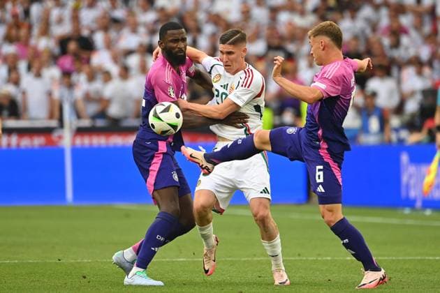 Antonio Ruediger GER and Joshua KIMMICH GER , action,duel against Roland SALLAI HUN group phase group A Germany GER Hungary HUN 2 0 on 19 06 2024, Stuttgart Arena Football UEFA EURO 2024 GERMANY from 14 06 2024 14 07 2024