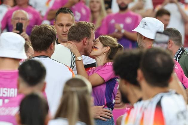 Kiss from national coach Julian Nagelsmann Germany to his partner Lena Wurzenberger, winners kiss, preliminary round match M14, GER HUN, Group A, European Football Championship, Germany vs Hungary, European Football Championship, Germany vs Hungary, Stuttgart, 19 06 2024,