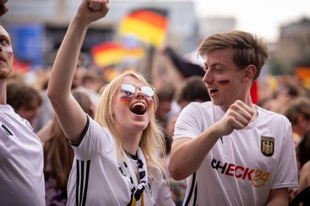 Fans of the German national team cheer and celebrate at the fan festival with public viewing on Stuttgarts Schlossplatz during the second group match against Hungary Stuttgart, EURO2024 Fan Festival Schlossplatz, 19 06 2024 Stuttgart Copyright: xDennisxDuddek xEibnerxPressefotox EP_DDK