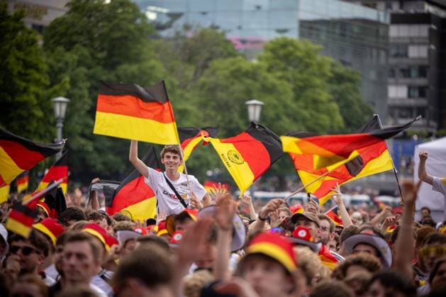 Fans of the German national team cheer and celebrate at the fan festival with public viewing on Stuttgarts Schlossplatz during the second group match against Hungary Stuttgart, EURO2024 Fan Festival Schlossplatz, 19 06 2024 Stuttgart Copyright: xDennisxDuddek xEibnerxPressefotox EP_DDK