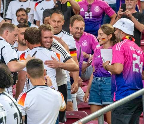 19 06 2024, Football UEFA EURO 2024, preliminary round, match day 2, Germany Hungary, at Stuttgart Arena Lena Wurzenberger Germany the girlfriend of coach Julian Nagelsmann Germany and coach Julian Nagelsmann Germany laugh heartily