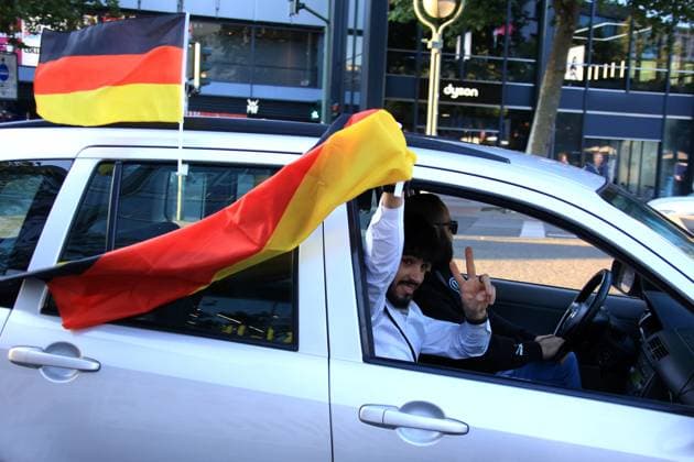DEU, FIFA, European Championship 2024, cheering in the City West, 19 06 2024, Kaiser Wilhelm Memorial Church, Tauentzienstrasse, Berlin, DEU, FIFA, European Championship 2024, cheering in the City West, in the picture motorcade, cheering fans, flags Photo Juergen Engler nordphoto GmbH nordphotoxGmbHx xEngler nph00076