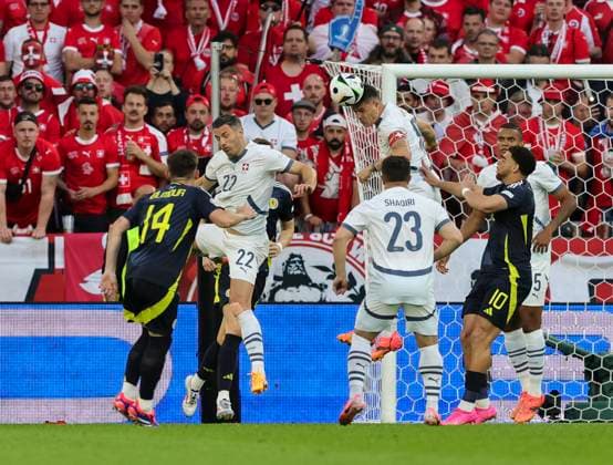 Scotland v Switzerland UEFA EURO, EM, Europameisterschaft,Fussball 2024 Group A Fabian Schär (left) and Granit Xhaka of Switzerland both go for the header during the UEFA Euro 2024 Group A match between Scotland and Switzerland at RheinEnergieStadion, Cologne Copyright: xPaulxChestertonx FIL-20271-0075 UK Newspapers OUT
