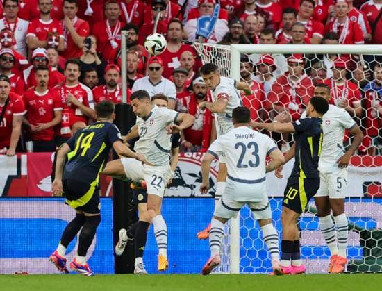 Scotland v Switzerland UEFA EURO, EM, Europameisterschaft,Fussball 2024 Group A Fabian Schär (left) and Granit Xhaka of Switzerland both go for the header during the UEFA Euro 2024 Group A match between Scotland and Switzerland at RheinEnergieStadion, Cologne Copyright: xPaulxChestertonx FIL-20271-0076 UK Newspapers OUT