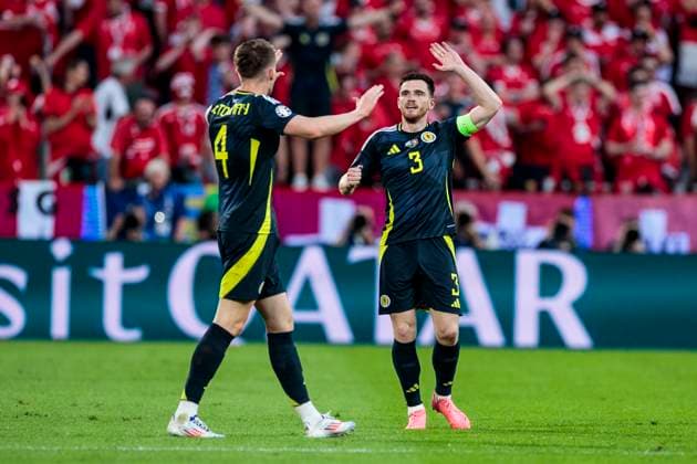 UEFA EURO 2024 Scotland Switzerland 19 06 2024 Scott McTominay Scotland, 4 and Andrew Robertson Scotland, 3 cheer after scoring UEFA EURO 2024 Scotland Switzerland Stadium Cologne, Cologne on 19 06 2024 Copyright: xBEAUTIFULxSPORTS Meuselx