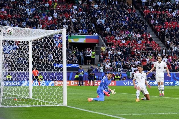 Soccer UEFA EURO 2024 Group Stage 2 Matchday Scotland Switzerland on 19 06 2024 at Köln Stadion in Cologne Goal for 1 0 by Scott McTominay Scotland Own goal Fabian Schär Switzerland xRx