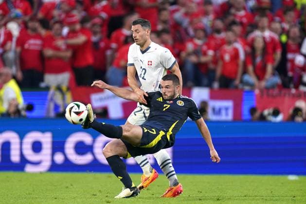 2024-06-19 Scotland v Switzerland - Group A - UEFA EURO, EM, Europameisterschaft,Fussball 2024 COLOGNE, GERMANY - JUNE 19: Fabian Schar of Switzerland battles for the ball with John McGinn of Scotland during the Group A - UEFA EURO 2024 match between Scotland and Switzerland at Cologne Stadium on June 19, 2024 in Cologne, Germany. (Photo by Joris Verwijst BSR Agency) Cologne Germany Content not available for redistribution in The Netherlands directly or indirectly through any third parties. Copyright: xBSRxAgencyx