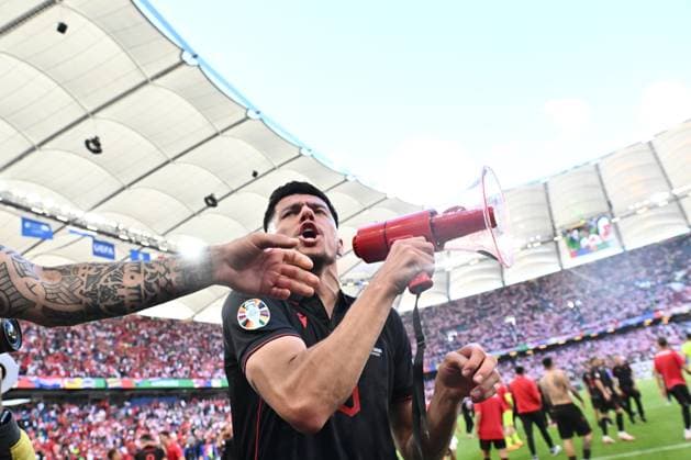 HAMBURG, GERMANY - JUNE 19: Mirlind Daku of Albania celebrates with a megaphone after the UEFA EURO, EM, Europameisterschaft,Fussball 2024 group stage match between Croatia and Albania at Volksparkstadion on June 19, 2024 in Hamburg, Croatia v Albania: Group B - UEFA EURO 2024 Copyright: xSebastianxFrejx