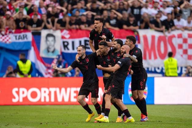 HAMBURG, GERMANY - JUNE 19: Klaus Gjasula of Albania celebrate with Elseid Hysaj, Arlind Ajeti after scoring the equalising goal during the UEFA EURO, EM, Europameisterschaft,Fussball 2024 group stage match between Croatia and Albania at Volksparkstadion on June 19, 2024 in Hamburg, Croatia v Albania: Group B - UEFA EURO 2024 Copyright: xSebastianxFrejx