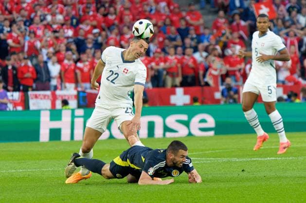 UEFA European Football Championship - UEFA EURO, EM, Europameisterschaft,Fussball 2024 - Scotland vs Switzerland Fabian Schar of Swiss in action against John McGinn of Scotland during UEFA Euro 2024 - Scotland vs Switzerland, UEFA European Football Championship in Colony, Germany, June 19 2024 Colony Germany  Copyright: xIPAxSport ABACAx