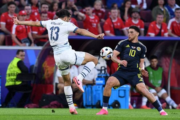 Soccer UEFA EURO 2024 Group Stage 2 Matchday Scotland Switzerland on 19 06 2024 at Köln Stadion in Cologne Ricardo Rodriguez Switzerland , left Che Adams Scotland , right xRx