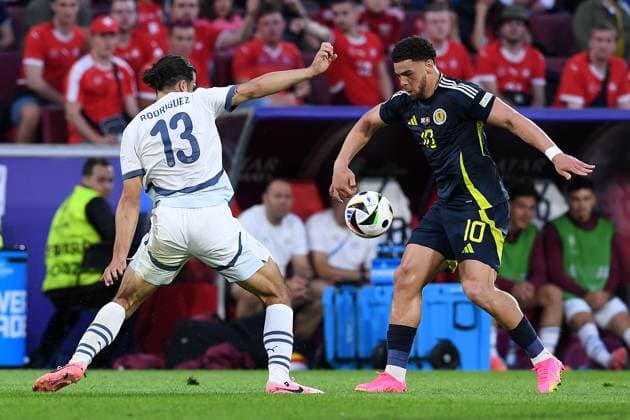Soccer UEFA EURO 2024 Group Stage 2 Matchday Scotland Switzerland on 19 06 2024 at Köln Stadion in Cologne Ricardo Rodriguez Switzerland , left Che Adams Scotland , right xRx