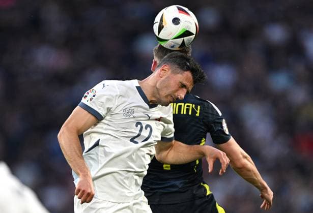 Fußball EURO 2024 Scotland - Switzerland 8711996 19.06.2024 Switzerland s Fabian Schar, left, and Scotland s Scott McTominay head a ball during the UEFA EURO, EM, Europameisterschaft,Fussball 2024 Group A soccer match between Scotland and Switzerland at the Cologne Stadium in Cologne, Germany. Alexey Filippov Sputnik Cologne Germany  Copyright: xAlexeyxFilippovx