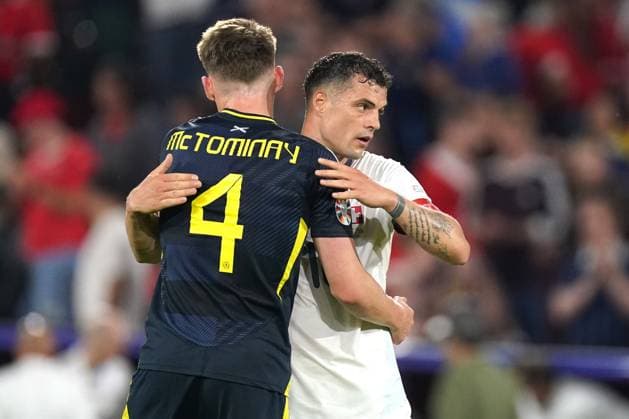 2024-06-19 Scotland v Switzerland - Group A - UEFA EURO, EM, Europameisterschaft,Fussball 2024 COLOGNE, GERMANY - JUNE 19: Scott McTominay of Scotland and Granit Xhaka of Switzerland during the Group A - UEFA EURO 2024 match between Scotland and Switzerland at Cologne Stadium on June 19, 2024 in Cologne, Germany. (Photo by Joris Verwijst BSR Agency) Cologne Germany Content not available for redistribution in The Netherlands directly or indirectly through any third parties. Copyright: xBSRxAgencyx