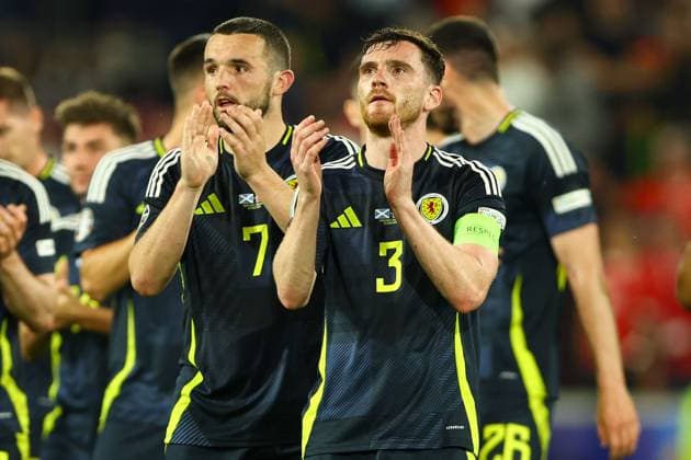 Andrew Robertson of Scotland (R) and John McGinn of Scotland (L) applauds fans at full-time Scotland v Switzerland, UEFA European Championship, EM, Europameisterschaft 2024, Group A, Football, Cologne Stadium, Cologne, Germany, 19 Jun 2024 EDITORIAL USE ONLY No use with unauthorised audio, video, data, fixture lists, club league logos or live services. Online in-match use limited to 120 images, no video emulation. No use in betting, games or single club league player publications. Copyright: xKieranxMcManus Shutterstockx 14543653cq