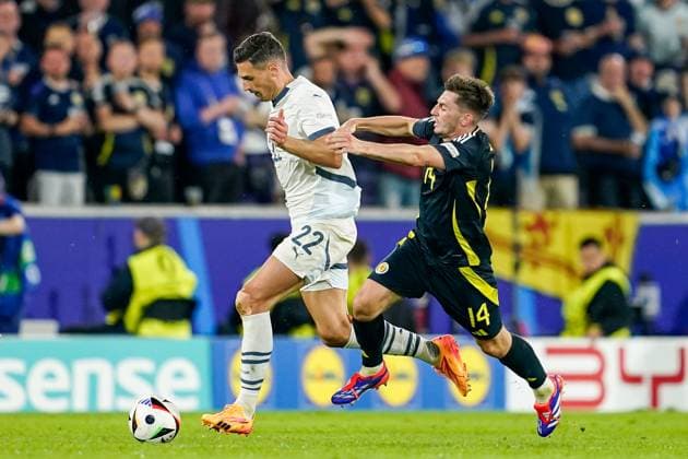 Cologne, Germany, June 19th 2024: Fabian Schar (22 Switzerland) and Billy Gilmour (14 Scotland) battle for the ball (duel) during the UEFA EURO, EM, Europameisterschaft,Fussball 2024 Germany Group A football match between Scotland and Switzerland at Cologne Stadium in Cologne, Germany. (Daniela Porcelli SPP) Copyright: xDanielaxPorcellix xSPPx spp-en-DaPoSp-20240619-_DP12279