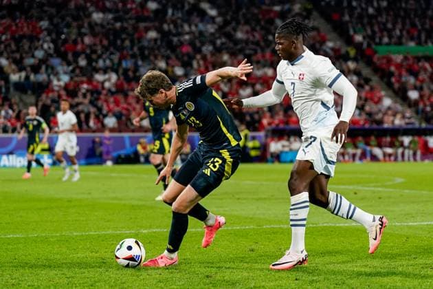 Cologne, Germany, June 19th 2024: Jack Hendry (13 Scotland) and Breel Embolo (7 Switzerland) battle for the ball (duel) during the UEFA EURO, EM, Europameisterschaft,Fussball 2024 Germany Group A football match between Scotland and Switzerland at Cologne Stadium in Cologne, Germany. (Daniela Porcelli SPP) Copyright: xDanielaxPorcellix xSPPx spp-en-DaPoSp-20240619-_DP20439