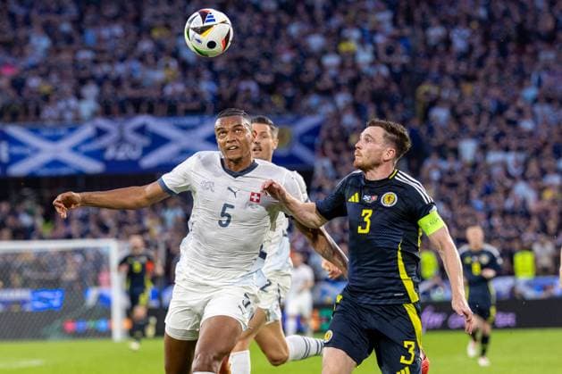 Scotland v Switzerland - UEFA EURO, EM, Europameisterschaft,Fussball 2024 Manuel Akanji, Andrew Robertson are playing during the UEFA Euro 2024 Group A match between Scotland v Switzerland, at the Cologne Stadium in Cologne, Germany, on June 19, 2024. Cologne Germany  Copyright: xAndrzejxIwanczukx originalFilename:iwanczuk-scotland240619_npcYN.jpg