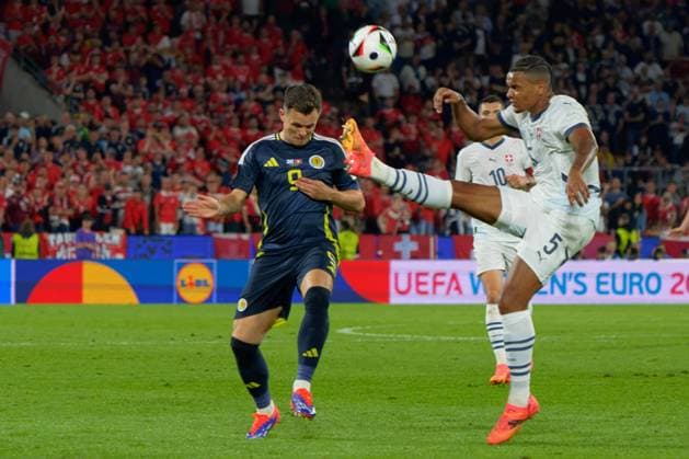 Manuel Akanji of Swiss in action against Lawrence Shankland of Scotland during UEFA EURO, EM, Europameisterschaft,Fussball 2024 - Scotland vs Switzerland, UEFA European Football Championship in Colony, Germany, June 19 2024  Copyright: xEmmanuelexMastrodonato IPAxSportx xx IPA_47288595 IPA_Agency_IPA47288595