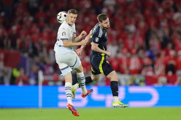 Scotland v Switzerland UEFA EURO, EM, Europameisterschaft,Fussball 2024 Group A Michel Aebischer of Switzerland and Anthony Ralston of Scotland in action during the UEFA Euro 2024 Group A match between Scotland and Switzerland at RheinEnergieStadion, Cologne Copyright: xPaulxChestertonx FIL-20271-0198 UK Newspapers OUT