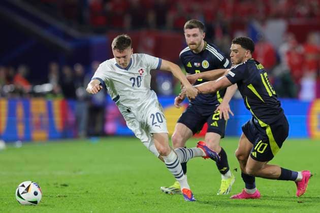 Scotland v Switzerland UEFA EURO, EM, Europameisterschaft,Fussball 2024 Group A Michel Aebischer of Switzerland is fouled by Che Adams of Scotland during the UEFA Euro 2024 Group A match between Scotland and Switzerland at RheinEnergieStadion, Cologne Copyright: xPaulxChestertonx FIL-20271-0204 UK Newspapers OUT