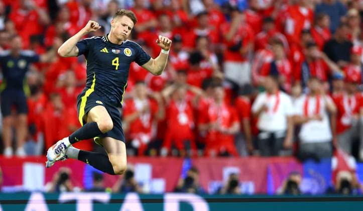 Scott McTominay of Scotland celebrates scoring a goal to make the score 1-0 Scotland v Switzerland, UEFA European Championship, EM, Europameisterschaft 2024, Group A, Football, Cologne Stadium, Cologne, Germany, 19 Jun 2024 EDITORIAL USE ONLY No use with unauthorised audio, video, data, fixture lists, club league logos or live services. Online in-match use limited to 120 images, no video emulation. No use in betting, games or single club league player publications. Copyright: xKieranxMcManus Shutterstockx 14543653gh