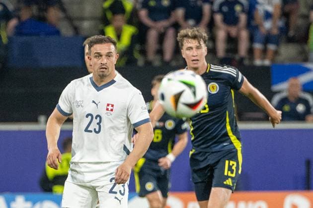 GER, EURO 2024, Group A, Scotland SCT vs Switzerland SUI 19 06 2024, Cologne Stadium, Cologne, GER, EURO 2024, Group A, Scotland SCT vs Switzerland SUI In the picture Xherdan Shaqiri Switzerland SUI, 23 Jack Hendry Scotland SCT, 13 the ball in view Gestures, facial expressions, emotions nordphotoxGmbHxx xDenkinger nph00015