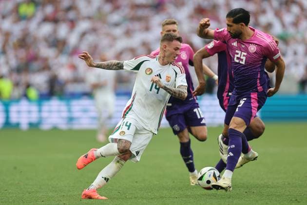 Bendeguz Bolla (Hungary)Emre Can (Germany) during the UEFA EURO, EM, Europameisterschaft,Fussball Germany 2024 match between Germany 2-0 Hungary at Stuttgart Arena on June 19, 2024 in Stuttgart, Germany. Noxthirdxpartyxsales  (256970996)
