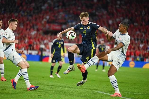Michel Aebischer (Switzerland)Scott McTominay (Scotland)Manuel Akanji (Switzerland) during the UEFA EURO, EM, Europameisterschaft,Fussball Germany 2024 match between Switzerland 1-1 Scotland at Cologne Stadium on June 19, 2024 in Cologne, Germany. Noxthirdxpartyxsales  (256971370)
