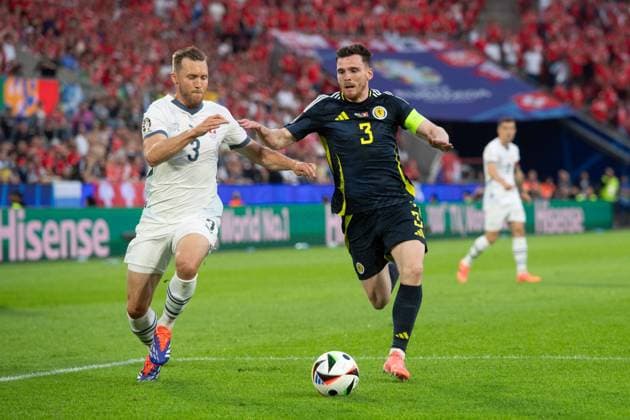 Andrew ROBERTSON SCO vs WIDMER Silvan SUI Action, Duel, Group Stage Group A Scotland SCO Switzerland SUI 1 1 on 19 06 2024 Stadion Koeln, Cologne Stadium, Football UEFA EURO 2024 GERMANY from 14 06 2024 14 07 2024 Â